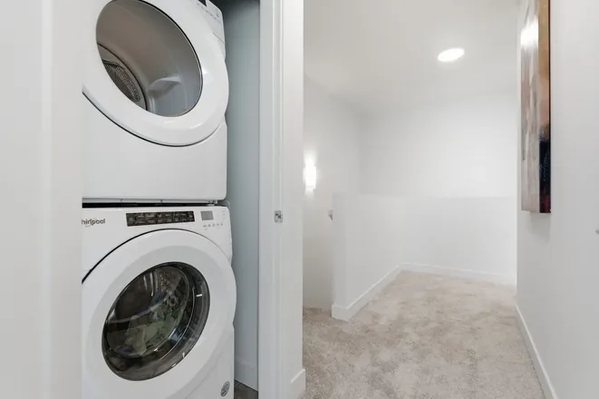 Stacked laundry in the Alpha show home